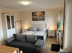 Ferienwohnung Ritthoff Perlebucht - mit Strandkorb am Meer und kostenloser Eintritt ins Schwimmbad